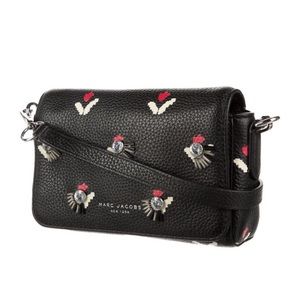 Description
•   Marc Jacobs Crossbody Bag
•   Black Leather